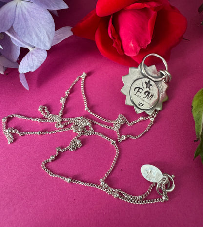 Sterling Silver & Dragon’s Breath Glass Sun Necklace